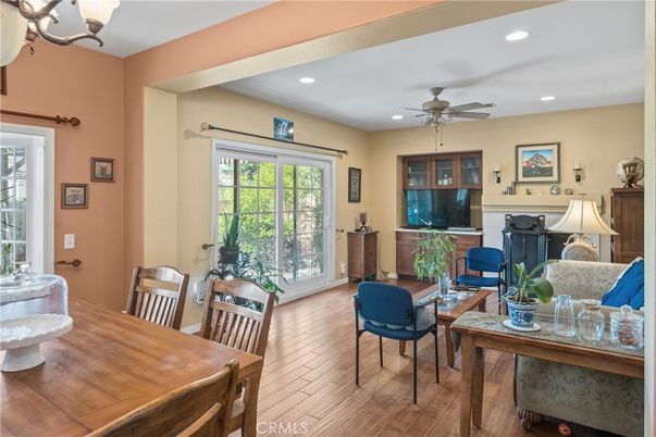 Dining room, Fireplace, Interior, Living room, Recessed Lighting, Wood Texture Flooring