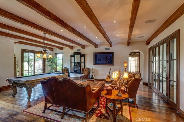 Billiard Table, Chandelier, Game Room, Interior, Living room, Pendant Lights, Recessed Lighting, Wooden Beams, Wood Texture Flooring