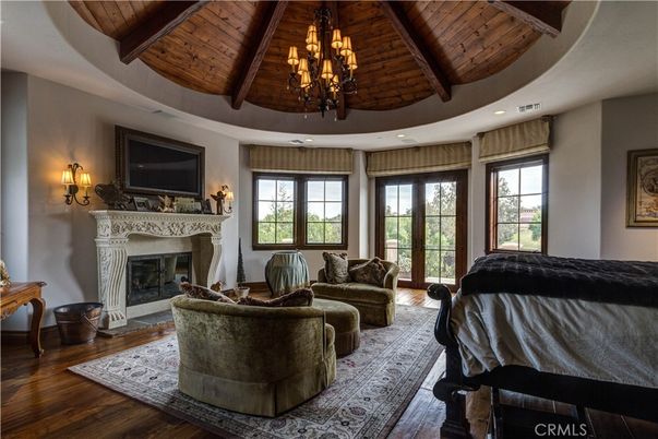 Chandelier, Fireplace, Interior, Living room, Recessed Lighting, Wooden Beams, Wooden Ceilings, Wood Texture Flooring