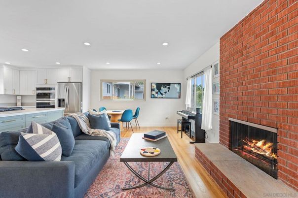 Dining room, Fireplace, Interior, Kitchen, Living room, Recessed Lighting, Stainless Steel Appliances, Stone Walls, Wood Texture Flooring