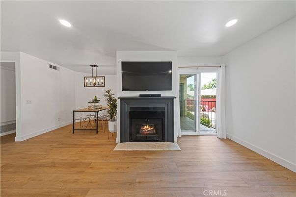 Dining room, Fireplace, Interior, Pendant Lights, Recessed Lighting, Wood Texture Flooring