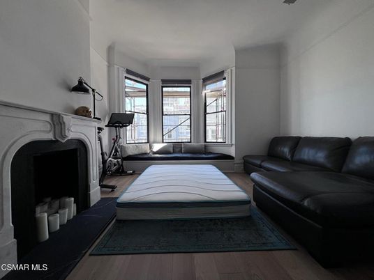 Bedroom, Fireplace, Fitness Equipment, Interior, Wood Texture Flooring