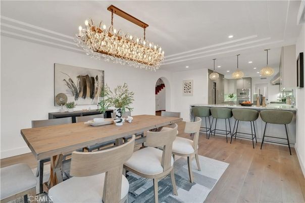 Chandelier, Dining room, Interior, Kitchen, Pendant Lights, Recessed Lighting, Stainless Steel Appliances, Wood Texture Flooring