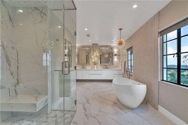 Bathroom, Dual Sink Vanities, Free Standing Baths, Glass Shower, Interior, Marble, Marble Walls, Pendant Lights, Recessed Lighting