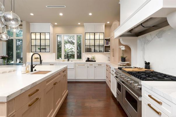 Interior, Kitchen, Marble Walls, Pendant Lights, Recessed Lighting, Stainless Steel Appliances, Wood Texture Flooring