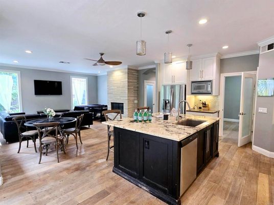 Dining room, Interior, Kitchen, Pendant Lights, Recessed Lighting, Stainless Steel Appliances, Wood Texture Flooring
