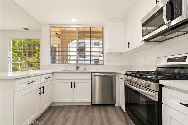 Interior, Kitchen, Recessed Lighting, Stainless Steel Appliances, Wood Texture Flooring