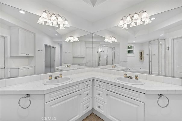Bathroom, Dual Sink Vanities, Glass Shower, Interior, Recessed Lighting, Tile Countertops
