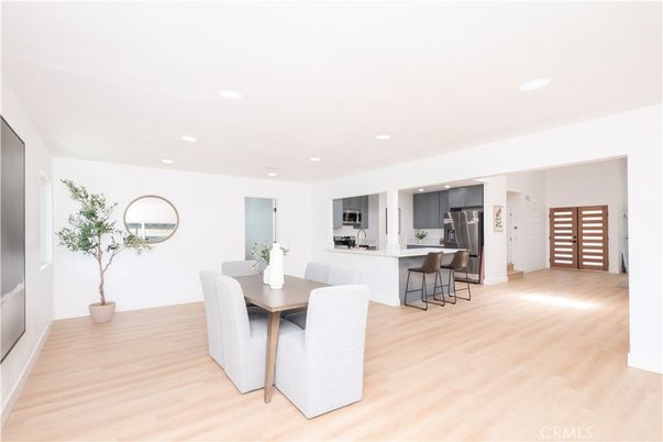 Dining room, Interior, Kitchen, Recessed Lighting, Stainless Steel Appliances, Wood Texture Flooring