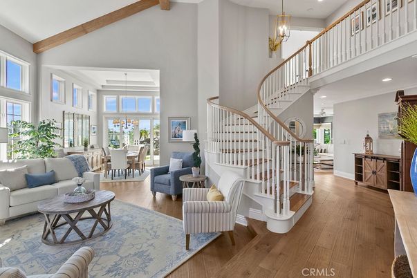 Chandelier, Dining room, Interior, Living room, Pendant Lights, Recessed Lighting, Wooden Beams, Wood Texture Flooring