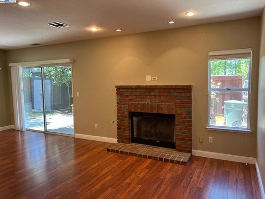 Empty room, Fireplace, Interior, Recessed Lighting, Wood Texture Flooring