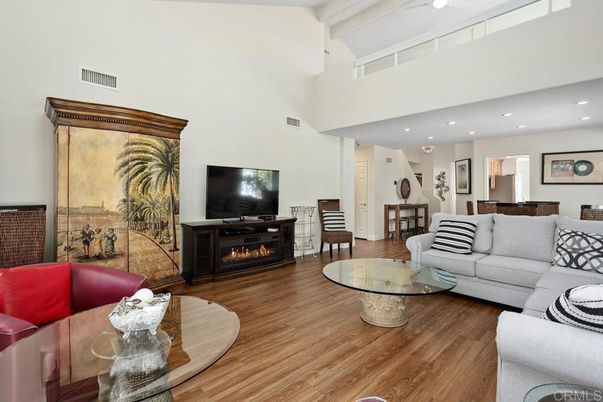 Dining room, Fireplace, Interior, Living room, Recessed Lighting, Wood Texture Flooring