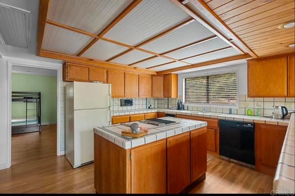 Interior, Kitchen, Tile Countertops, Wooden Ceilings, Wood Texture Flooring