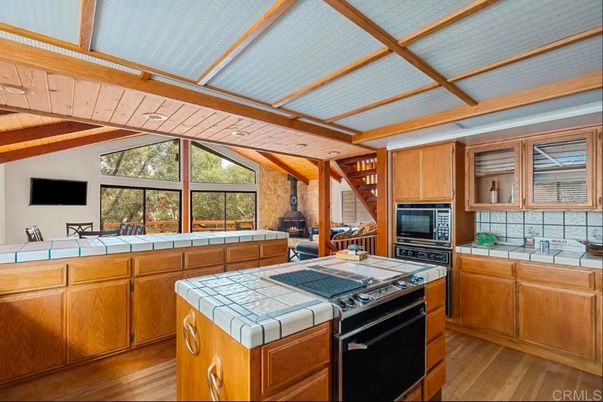 Fireplace, Interior, Kitchen, Tile Countertops, Wooden Beams, Wood Texture Flooring