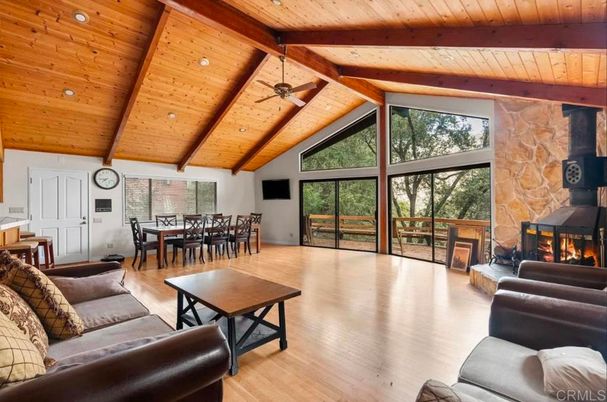 Dining room, Fireplace, Interior, Living room, Recessed Lighting, Stone Walls, Wooden Beams, Wooden Ceilings, Wood Texture Flooring