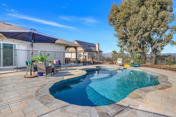 Exterior, Pool, Solar Panels