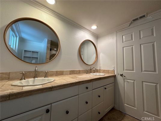 Bathroom, Dual Sink Vanities, Interior, Recessed Lighting, Tile Countertops