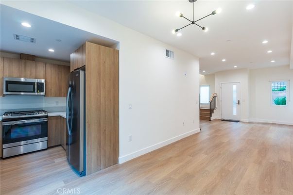 Interior, Kitchen, Pendant Lights, Recessed Lighting, Stainless Steel Appliances, Wood Texture Flooring