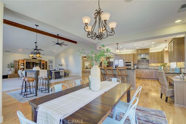 Chandelier, Dining room, Interior, Kitchen, Recessed Lighting, Stainless Steel Appliances, Wood Texture Flooring