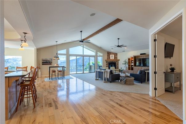 Dining room, Fireplace, Interior, Living room, Pendant Lights, Wooden Beams, Wood Texture Flooring