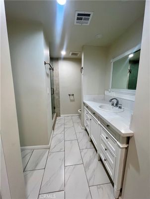 Bathroom, Dual Sink Vanities, Glass Shower, Interior, Marble, Recessed Lighting