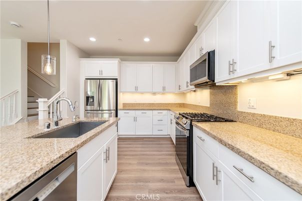 Interior, Kitchen, Pendant Lights, Recessed Lighting, Stainless Steel Appliances, Wood Texture Flooring