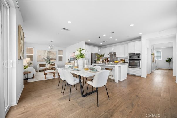 Dining room, Interior, Kitchen, Living room, Pendant Lights, Recessed Lighting, Stainless Steel Appliances, Wood Texture Flooring