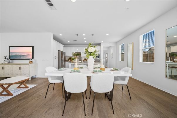 Dining room, Interior, Kitchen, Pendant Lights, Recessed Lighting, Stainless Steel Appliances, Wood Texture Flooring