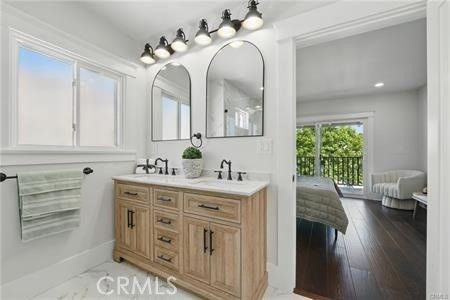 Bathroom, Dual Sink Vanities, Interior, Recessed Lighting, Wood Texture Flooring