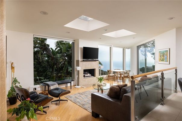 Fireplace, Interior, Living room, Recessed Lighting, Water, Wood Texture Flooring