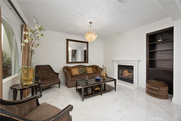 Chandelier, Fireplace, Interior, Living room, Marble