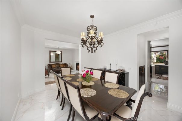Chandelier, Dining room, Fireplace, Interior, Marble