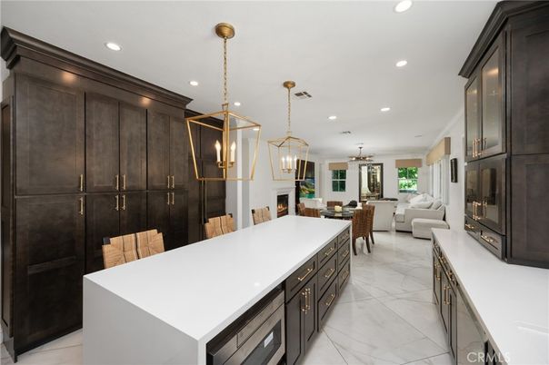 Dining room, Fireplace, Interior, Living room, Marble, Pendant Lights, Recessed Lighting