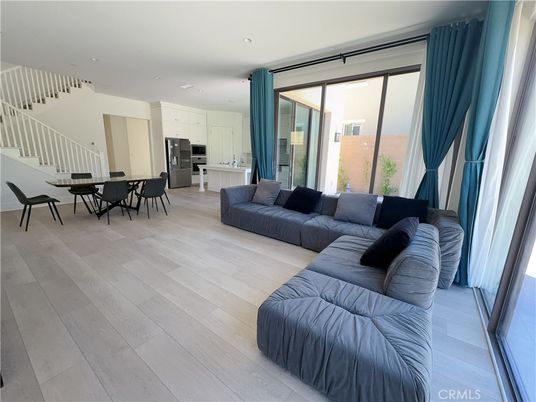 Dining room, Interior, Kitchen, Living room, Recessed Lighting, Stainless Steel Appliances, Wood Texture Flooring
