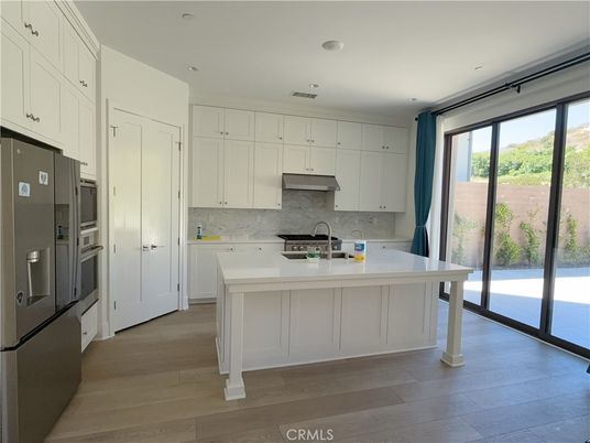Interior, Kitchen, Marble Walls, Recessed Lighting, Wood Texture Flooring