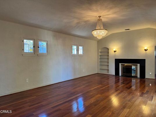 Chandelier, Empty room, Fireplace, Interior, Wood Texture Flooring