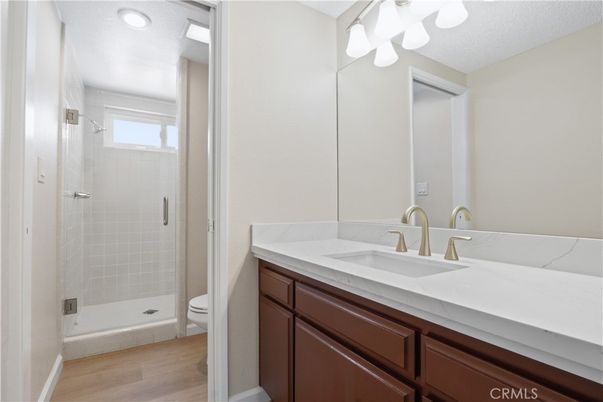 Bathroom, Glass Shower, Interior, Recessed Lighting, Wood Texture Flooring