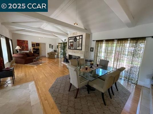 Dining room, Fireplace, Interior, Living room, Pendant Lights, Recessed Lighting, Wood Texture Flooring