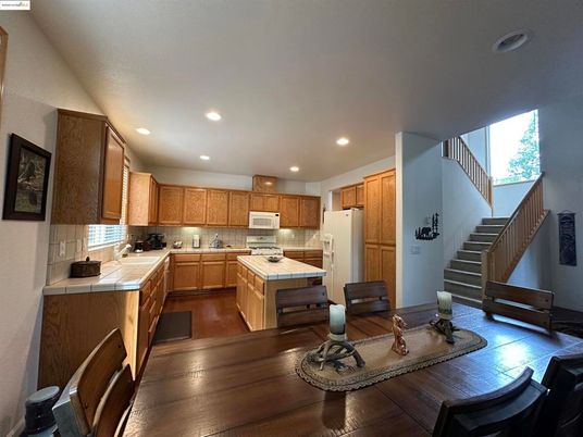 Dining room, Interior, Kitchen, Recessed Lighting, Tile Countertops, Wood Texture Flooring