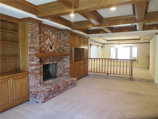Empty room, Fireplace, Interior, Pendant Lights, Recessed Lighting, Stone Walls, Wooden Beams