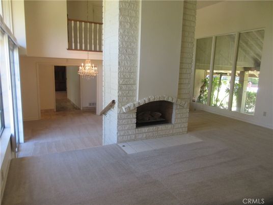Chandelier, Empty room, Fireplace, Interior