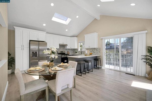 Dining room, Interior, Kitchen, Recessed Lighting, Stainless Steel Appliances, Wood Texture Flooring