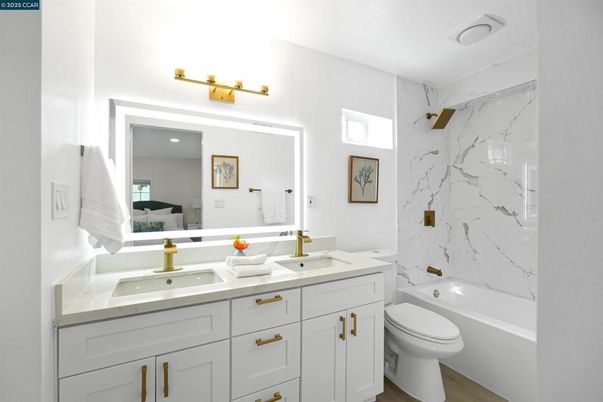 Bathroom, Dual Sink Vanities, Interior, Marble Walls, Recessed Lighting