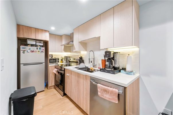 Interior, Kitchen, Recessed Lighting, Stainless Steel Appliances, Wood Texture Flooring
