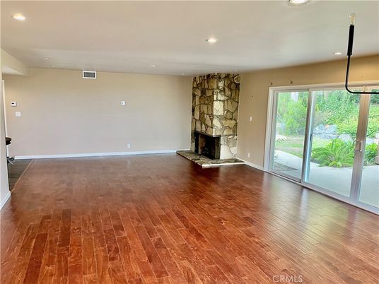 Empty room, Fireplace, Interior, Recessed Lighting, Wood Texture Flooring