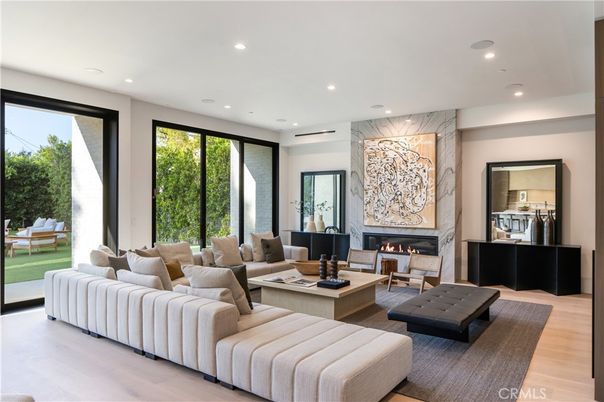 Fireplace, Interior, Living room, Marble Walls, Recessed Lighting, Wood Texture Flooring