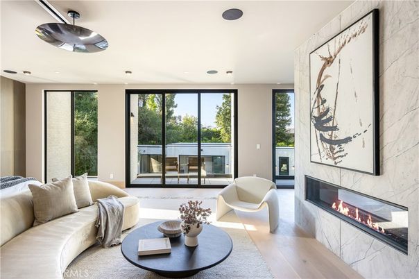 Fireplace, Interior, Living room, Marble Walls, Recessed Lighting, Wood Texture Flooring