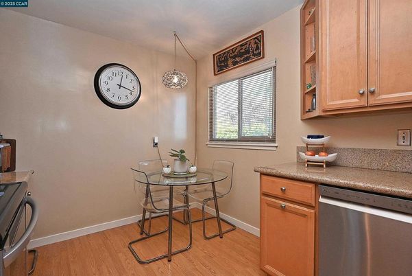 Dining room, Interior, Kitchen, Pendant Lights, Stainless Steel Appliances, Wood Texture Flooring