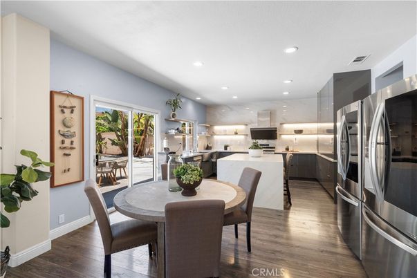 Dining room, Interior, Kitchen, Recessed Lighting, Stainless Steel Appliances, Wood Texture Flooring