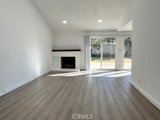 Empty room, Fireplace, Interior, Recessed Lighting, Wood Texture Flooring